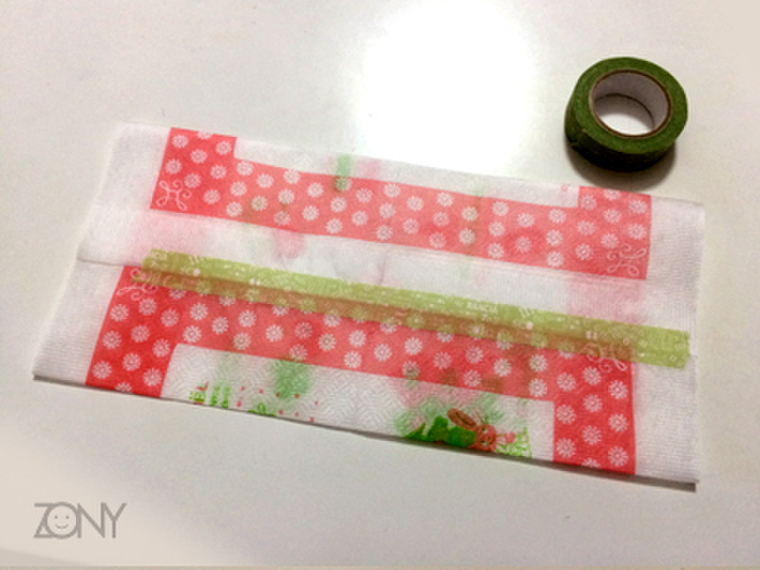 【手順1.真ん中で折って留める】