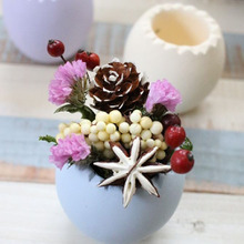 セリア*エッグ型コンテナでドライフラワーのアレンジ