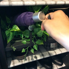 100均の人工芝で作る傘置き場