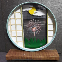 100均の材料で作った丸窓から見た月と花火