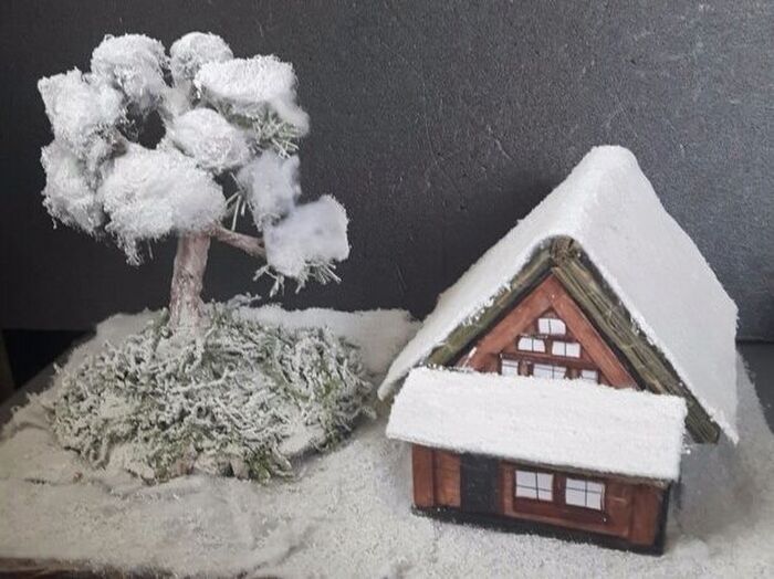 雪の降り積もる合掌造りの里を作る。