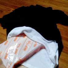 ママレンジ【キミの洋服、ママがおなかで、あたためる】ママもポカポカ、暖房節約にも効果アリ。