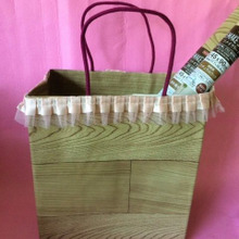 紙袋にリメイクシートを貼って防水効果ありのかわいい袋を作りました