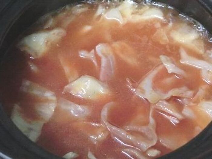 2.トマトジュースを入れて煮る