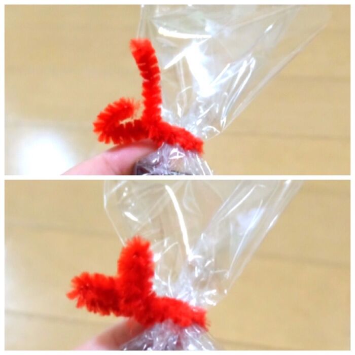 お菓子を詰めてモールで留める