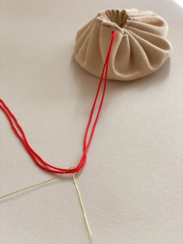 ビーズを通して開き口ストッパーに♪