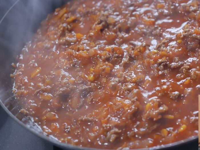 トマトジュースで煮込む