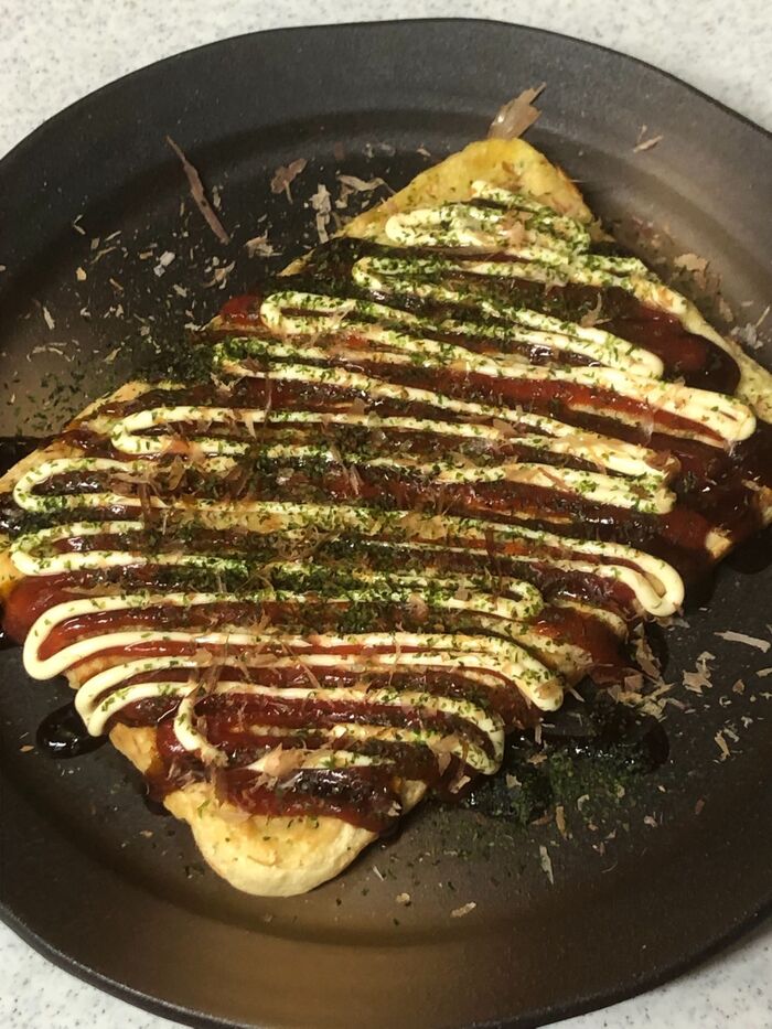 味付け、トッピングをする。