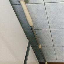 クイックルワイパーをスポンジホルダーで貼るだけ収納