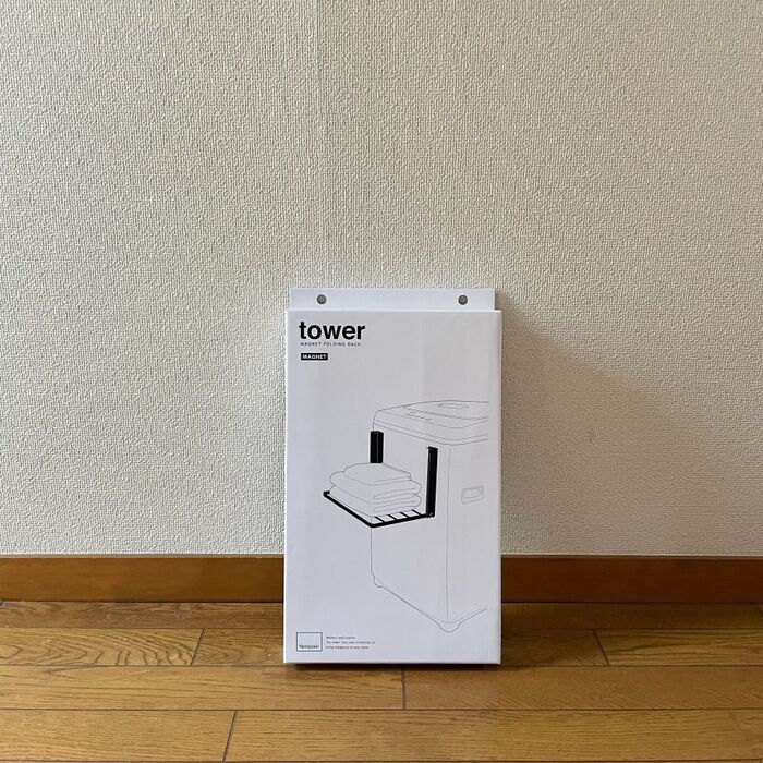 この状態を解決するために購入した洗濯機横マグネット折りたたみ棚