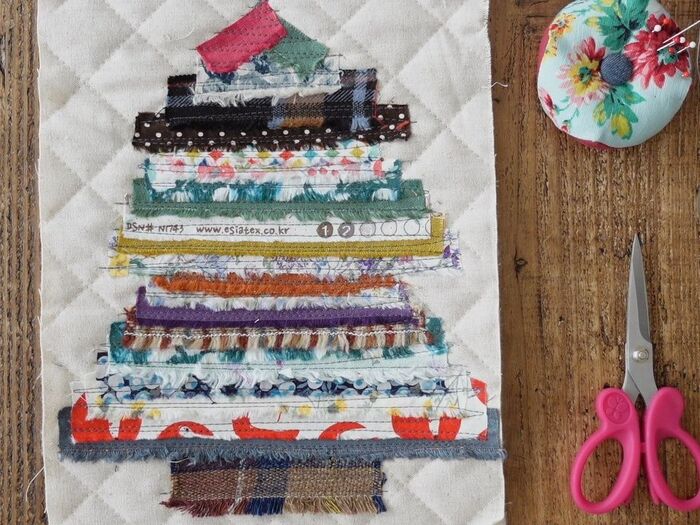 ミシンで一筆書きのように、大きくジグザグと一度に縫います。