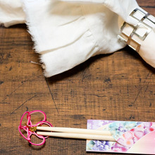 おせち料理の彩りを水引で誤魔化す。