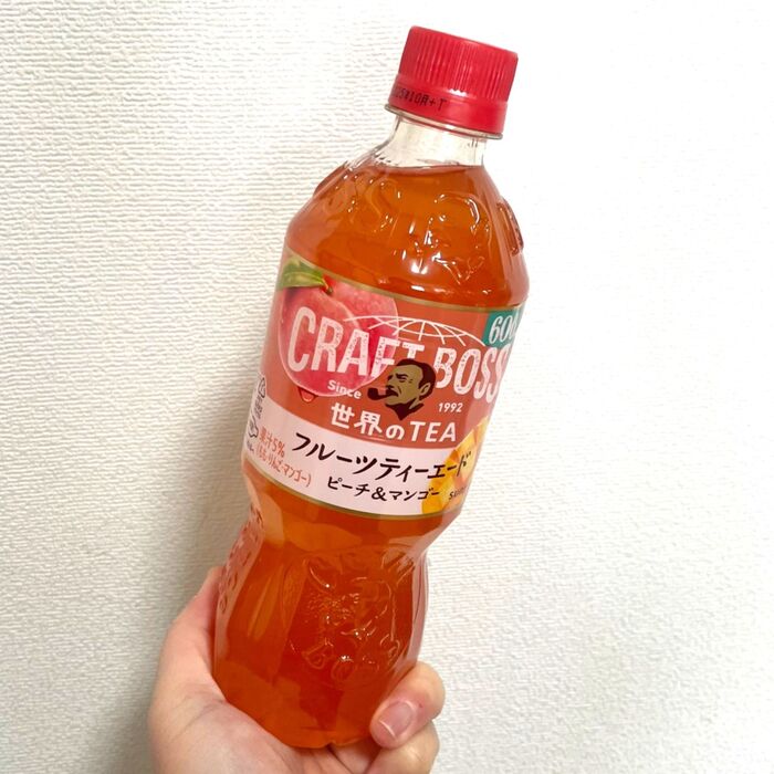 紅茶と烏龍茶がブレンドされた「クラフトボス フルーツティーエード ピーチ&マンゴー」
