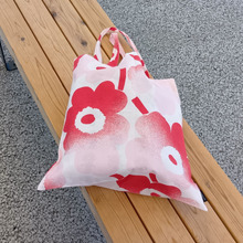 ミャクミャク似!?SNSを参考にしたマリメッコUnikko柄で楽しむ関西万博ファッション&万能バッグ