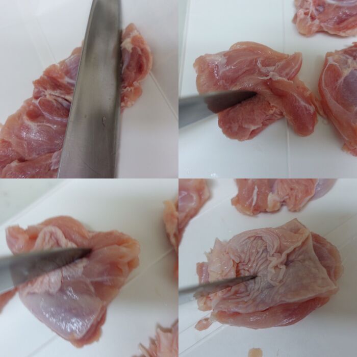 鶏もも肉をを切る。