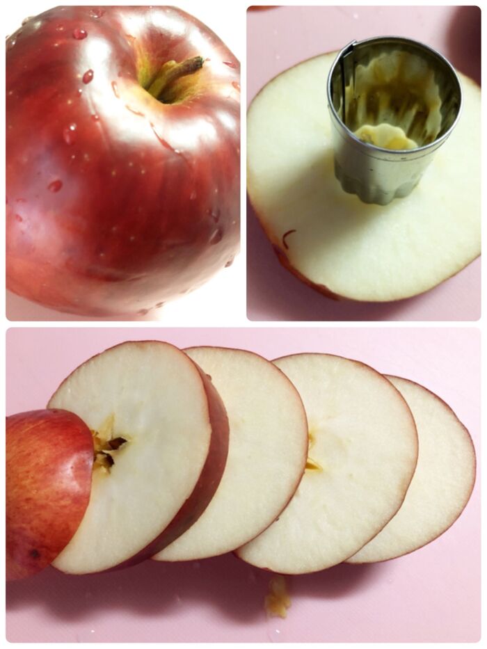 りんごを良く洗い、りんごを倒した状態でスライスします。種の部分を型抜きします。