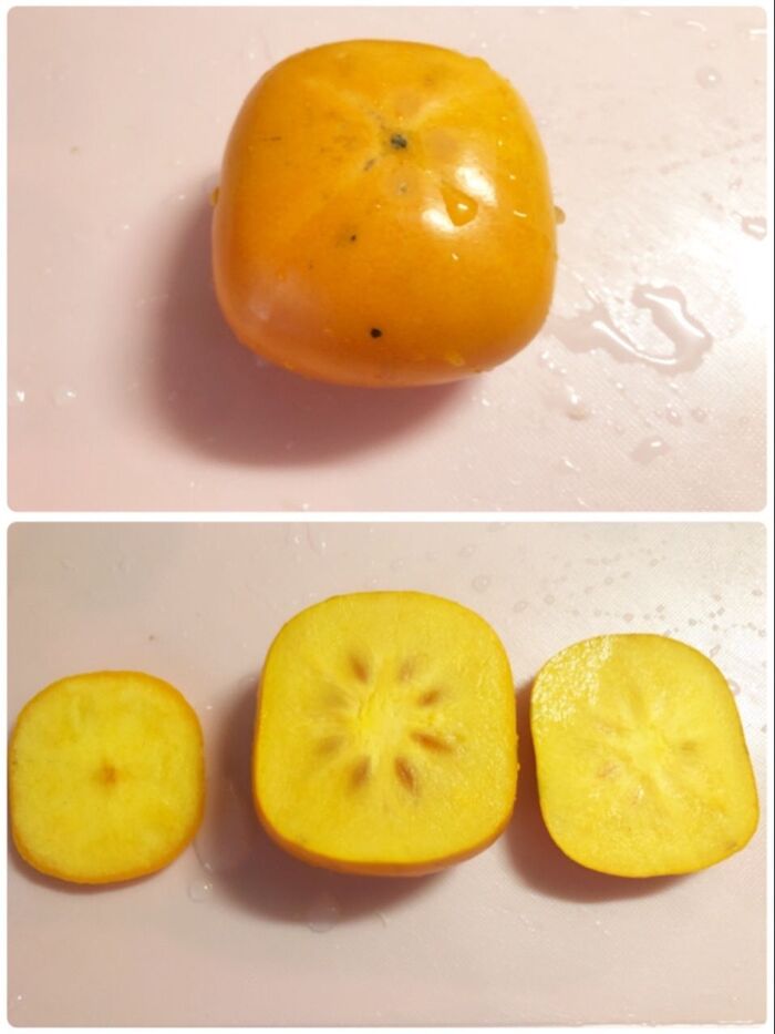 柿を洗って、３つに切ります