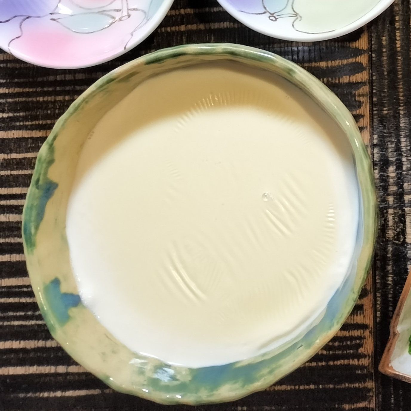 大きな耐熱容器に、材料●を入れて混ぜる→電子レンジで4分程加熱する