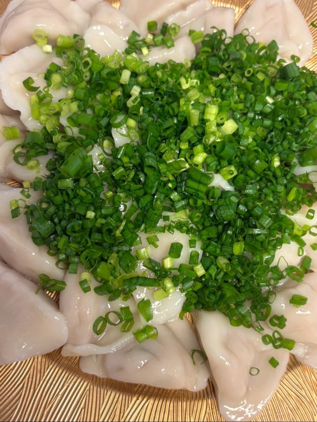 小葱を山盛りに乗せます。