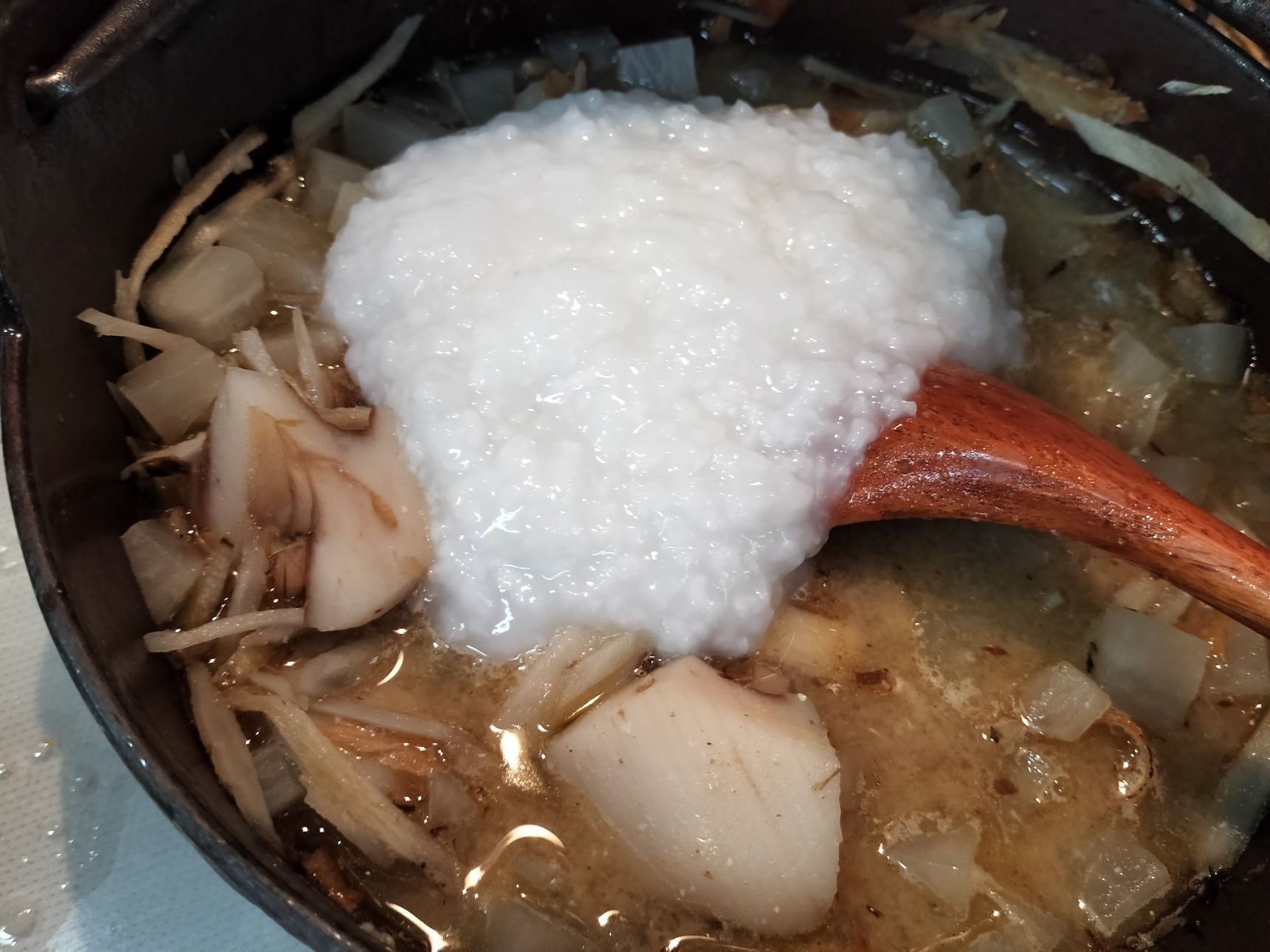 5、お粥を加えて混ぜる→弱火で5分程煮る