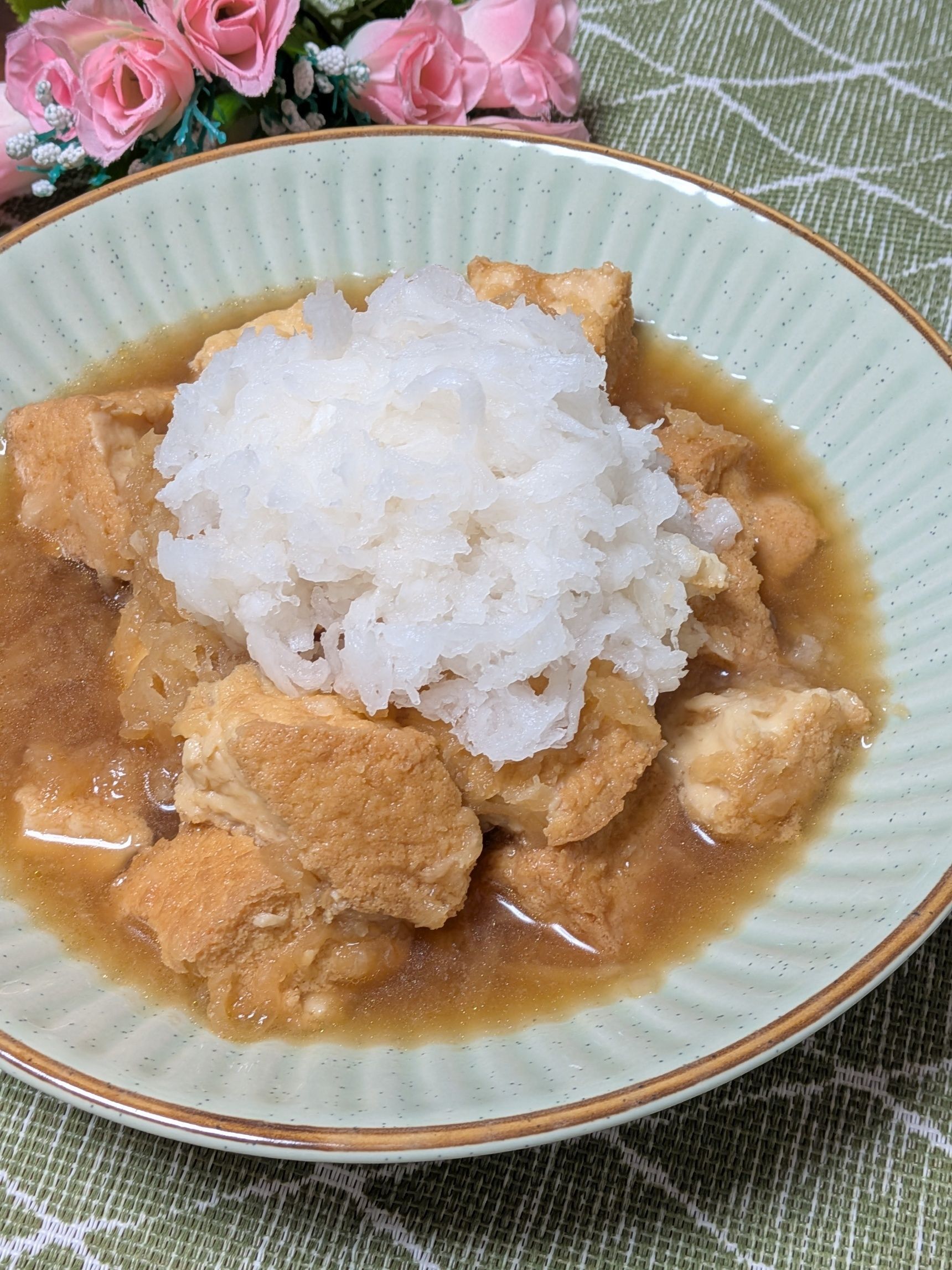 4. 器に取りだし、残しておいた大根おろしをのせる。