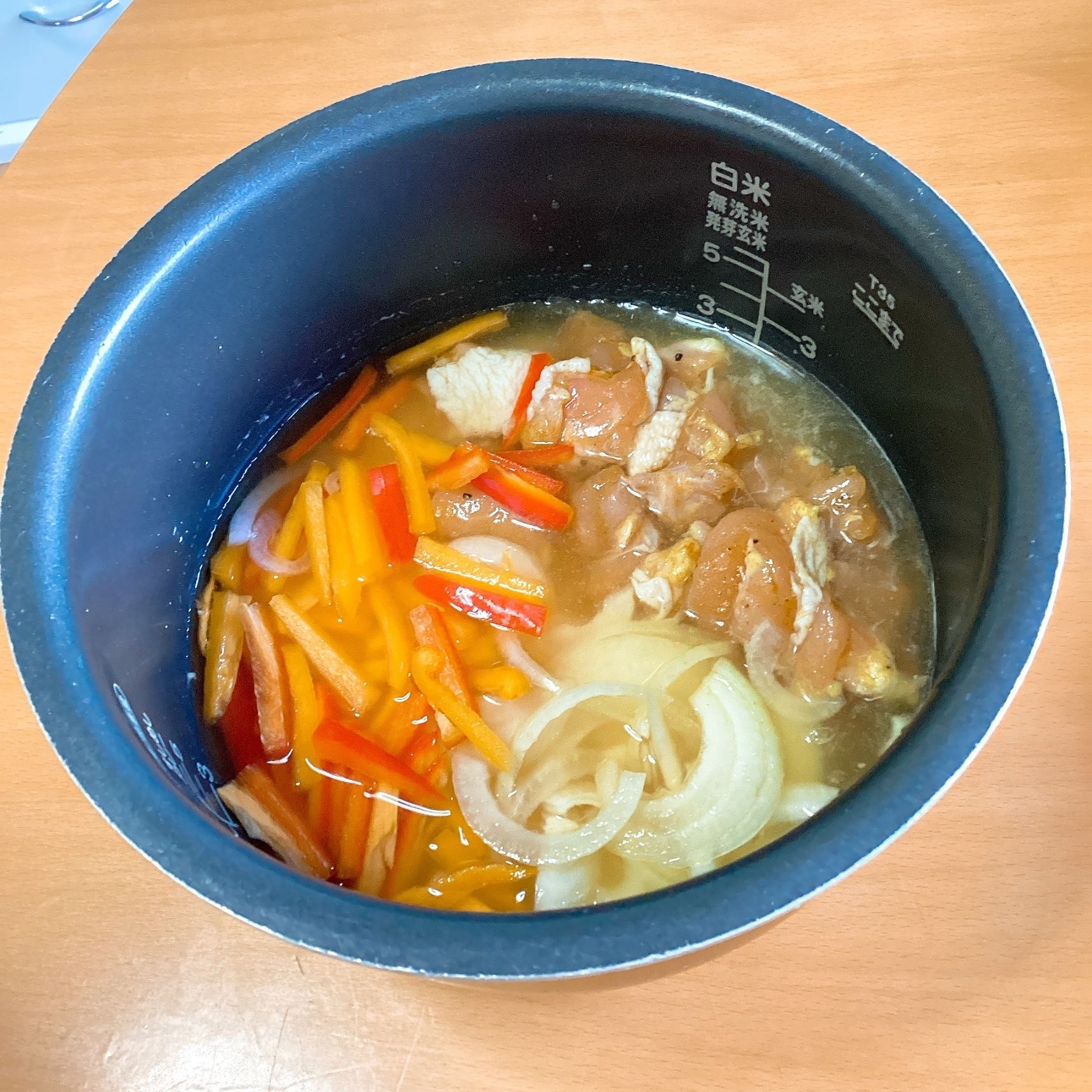 ③炊飯器に入れる。