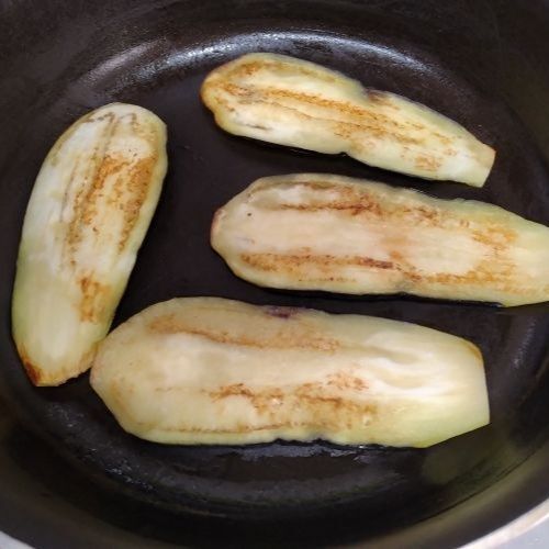 炒める