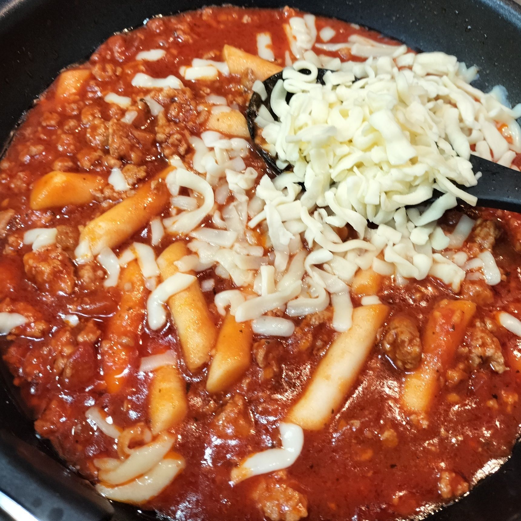 5、とろけるチーズを加えて混ぜる