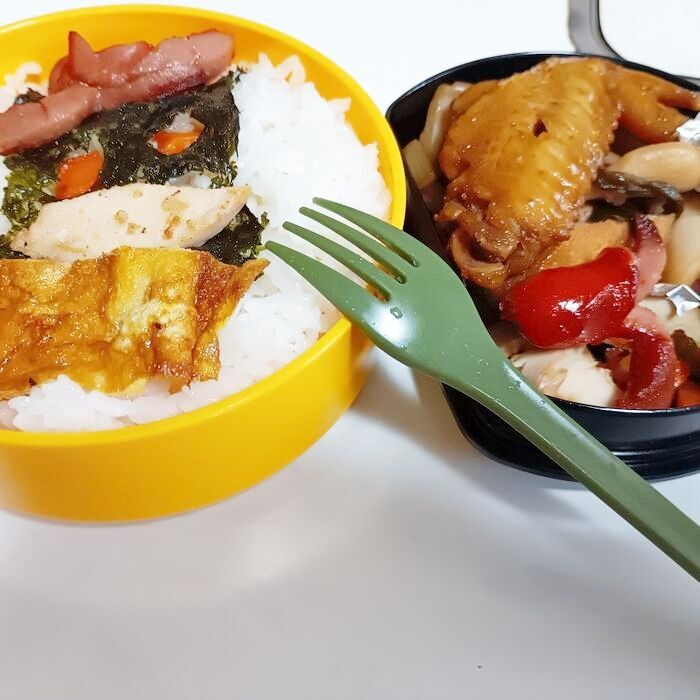 帽子をかぶり、卵のマフラー を巻いた「のりマン」で元気もりもり弁当