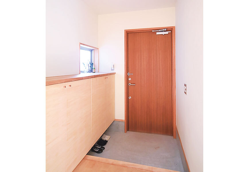 防火設備認定のチーク材ドアの玄関